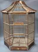 An hexagonal wood birdcage