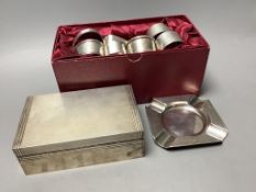 A presentation engine-turned silver cigarette box, a similar ashtray and a collection of silver