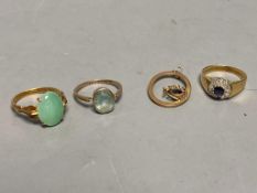 A yellow metal (stamped 14k) and green cabochon set ring, size N, gross 3.7 grams, a 9ct ring and