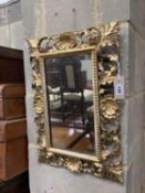 A Venetian foliate carved and pierced giltwood wall mirror, width 36cm, height 50cm51.5 x 36.5cm