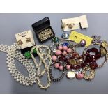 A box of costume jewellery.