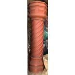 A 19th century Tudor style three-section terracotta chimney pot, height 203cm