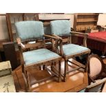 A set of six 1920's oak dining chairs two with arms