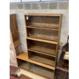 A Simplex teak five section bookcase, width 137cm, depth 35cm, height 198cm