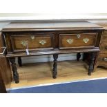 A small 18th century oak two drawer low dresser, width 124cm depth 56cm height 79cm