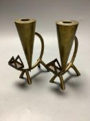 A pair of mid century brass 'cat' candlesticks, height 16.5cm