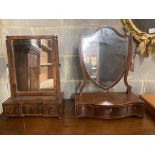 A shield-shaped mahogany toilet mirror with serpentine fronted box base and a walnut swing-frame