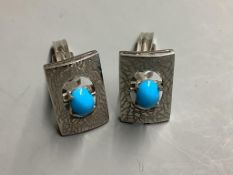 A pair of white metal (tests as 18ct) cufflinks set with turquoise,21mm, gross 13.5 grams.