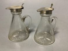A pair of George V silver mounted glass whisky tot jugs, S. Blanckensee & Sons Ltd, Birmingham,