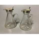 A pair of George V silver mounted glass whisky tot jugs, S. Blanckensee & Sons Ltd, Birmingham,