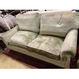 A George Smith two seater settee upholstered in pale green velvet, length 190cm, depth 90cm, height
