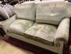 A George Smith two seater settee upholstered in pale green velvet, length 190cm, depth 90cm, height