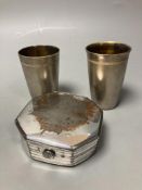 A silver plated puzzle box, 1754, and two boxed Russian beakers, 7.5cm