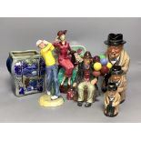 Five Royal Doulton figures or jugs, a Kevin Francis Susie Cooper figure and a Royal Doulton jar,