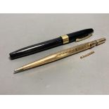 A 'Lifelong' 9ct gold-cased propelling pencil (a.f.) and a Sheaffer Imperial fountain pen,black