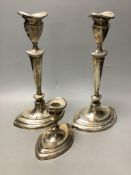 A pair of Mappin & Webb George III style silver candlesticks and a similar dwarf candlestick,all of