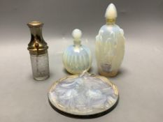 A collection of Sabino and other glass scent bottles and a plaque