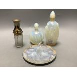 A collection of Sabino and other glass scent bottles and a plaque