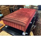 A large Victorian style rectangular upholstered footstool on six turned feet, length 156cm, depth