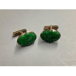 A pair of Chinese 14K gold and green jade oval cufflinks,21mm, gross 9.4 grams.