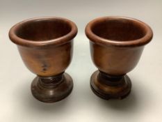 A pair of George III treen boxwood cups14cm