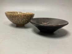 A Jian type crackle glaze bowl, diameter 10cm, and another Jian type bowl with one leaf