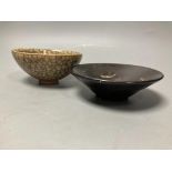 A Jian type crackle glaze bowl, diameter 10cm, and another Jian type bowl with one leaf