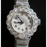 A lady's platinum and diamond set manual wind cocktail watch, on an 18ct white gold mesh link