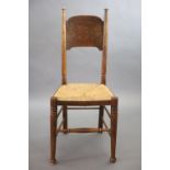 A set of six Arts & Crafts oak chairs, including a pair of carvers, in the Glasgow School m