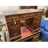 A late Victorian walnut kneehole desk, length 106cm, depth 60cm, height 74cm
