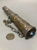 A Tibetan metal incense holder, length 33.5cm, and a Tibetan coin