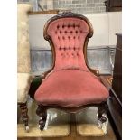 A Victorian mahogany framed buttoned back nursing chair