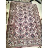 A Tabriz ivory ground rug, 200 x 136cm