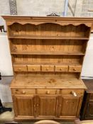 A Victorian style pine dresser, length 140cm, depth 44cm, height 208cm