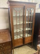 An Edwardian inlaid mahogany display cabinet, width 100cm, depth 33cm, height 194cm