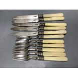 Five pairs of George V ivory handled silver dessert eaters and one other fork, Walker & Hall,