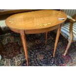 A painted oval satinwood occasional table, width 74cm, depth 51cm, height 70cm