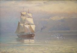 Frederick W. Baker (1862-1936), oil on board, sailing boat on a calm sea.signed,24 x 34cm