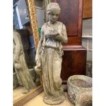 A reconstituted stone garden ornament of a lady with ewer, height 100cm