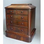 A Victorian miniature mahogany table top chest of drawers, height 35cm