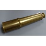 An early 20th century brass three drawer telescope, overall length 90.5cm extended