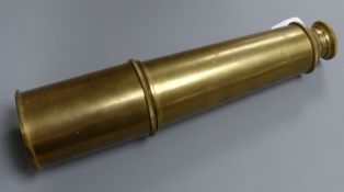 An early 20th century brass three drawer telescope, overall length 90.5cm extended