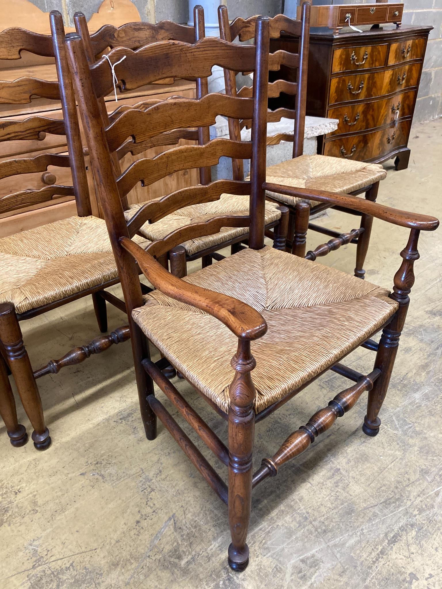 A set of five Lancashire ash and beech rush-seat ladderback chairs (one with arms) - Image 2 of 3