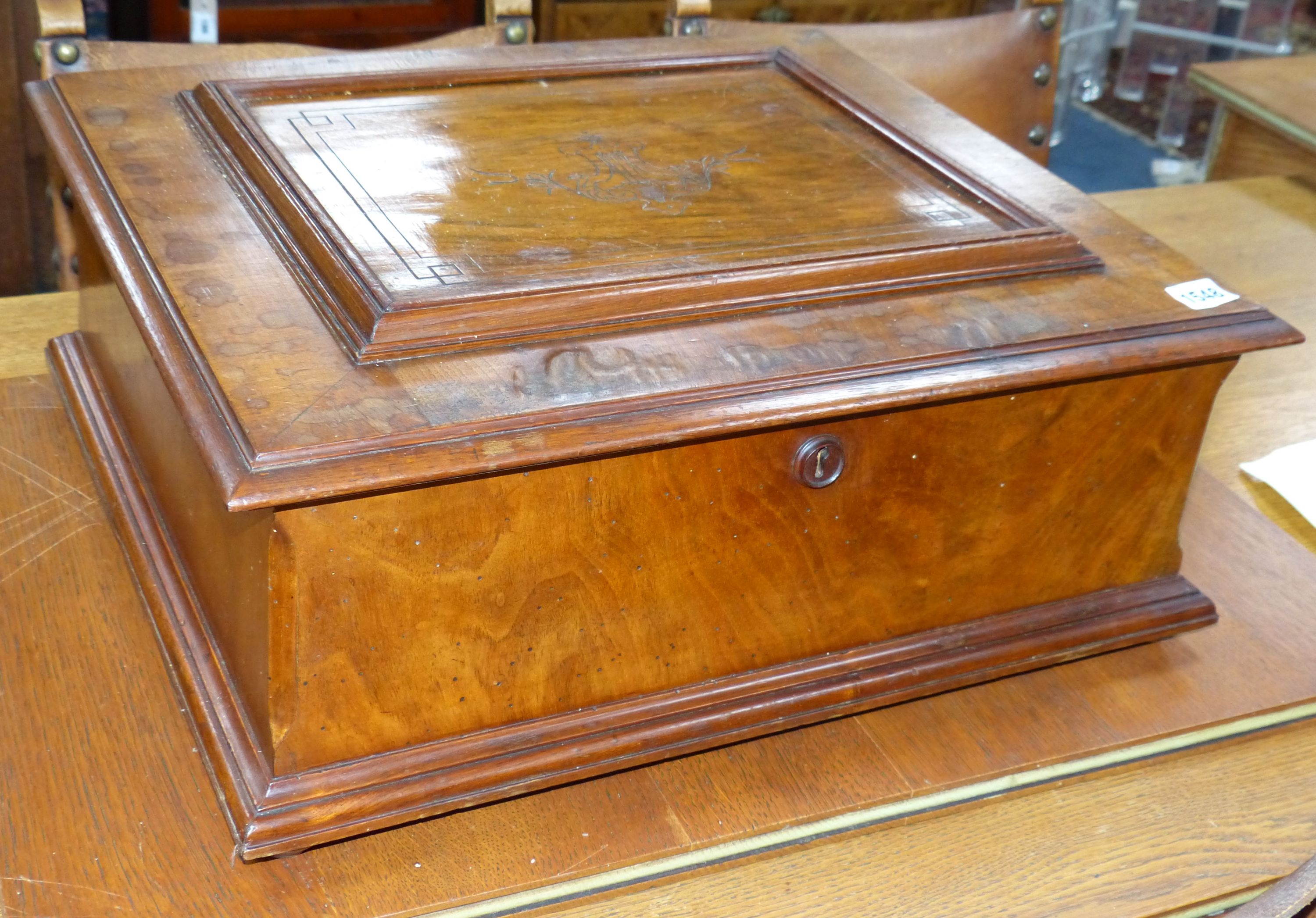 A large Polyphon walnut table top musical box, playing thirty 39.5cm discs