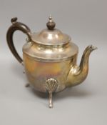 A circular silver teapot on three feet, Sheffield 1900,gross 16.5oz