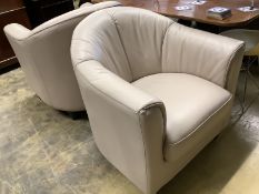 A pair of contemporary tub chairs upholstered in taupe hide, width 74cm, depth 76cm, height 80cm