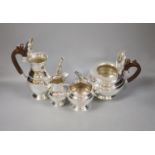 A four-piece silver 'Regent' tea service,of circular bulbous form, comprising teapot, hot water