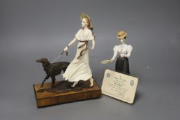 An Albany Fine China Deauville ceramic and bronze group of a girl with borzoi on walnut and