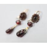 A pair of late Victorian gilt white metal?, facet, bead and pear shaped garnet set drop earrings,
