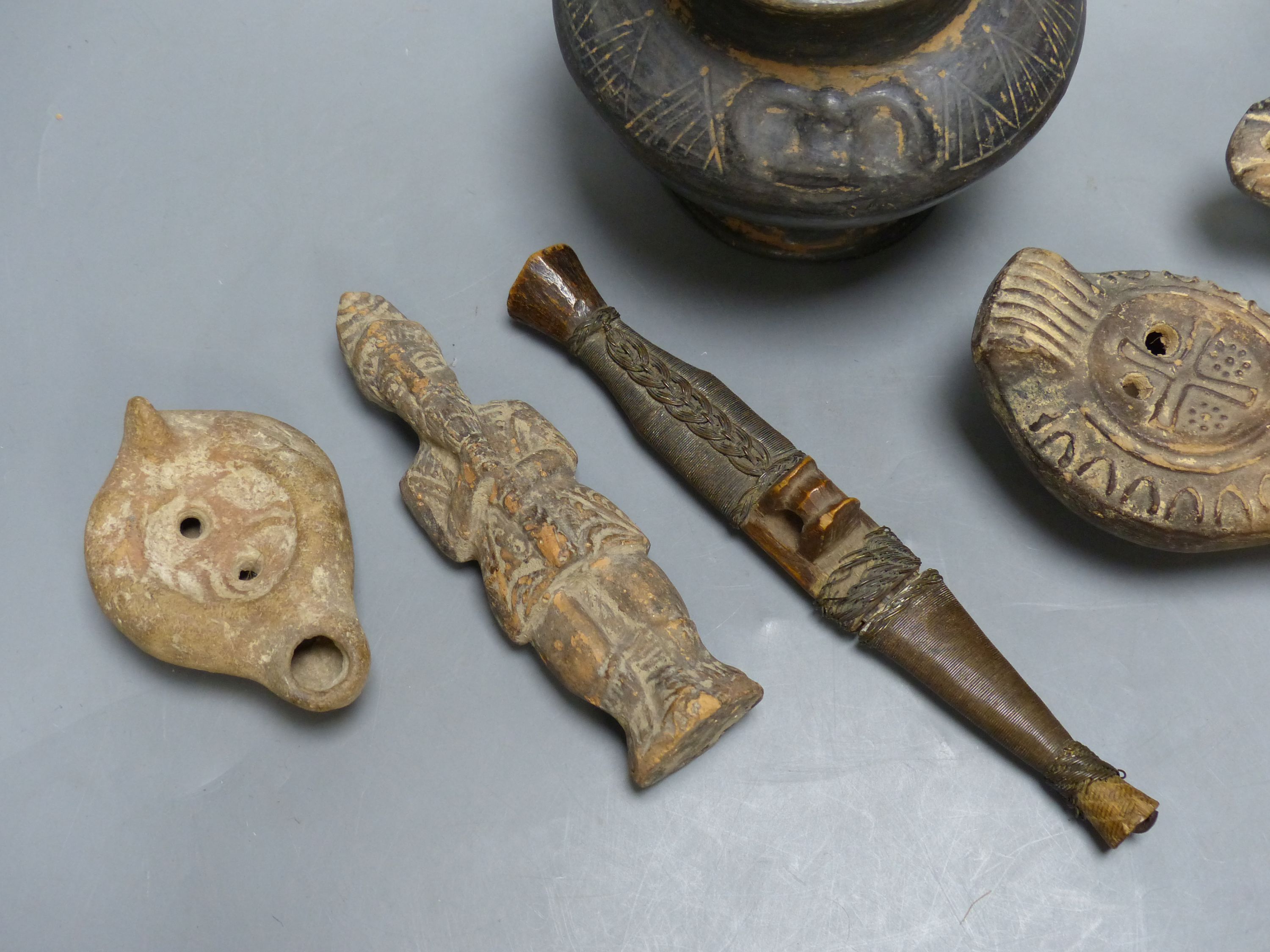 A group of antiquities, three oil lamps, a vase and a figure, etc. - Image 3 of 5